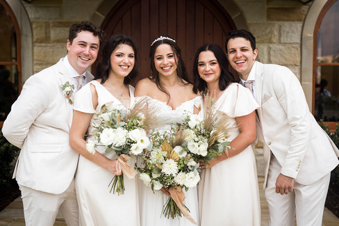 Bride and her siblings close up photo