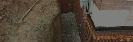 Exterior basement waterproofing in Toronto – foundation wall excavation and membrane installation to protect against groundwater.