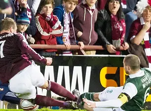 Hearts v Hibernian tackle.webp