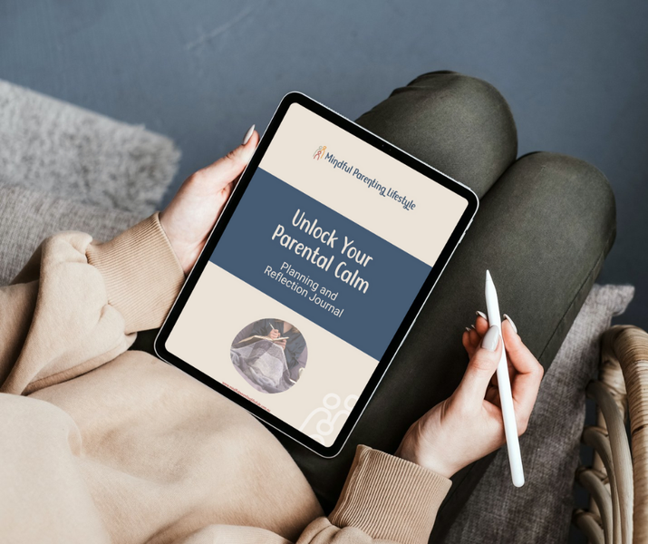 A woman sitting with the 30 Day Unlock Parental Calm Journal on her knee.