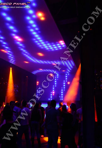 Creation of the best led lights for your club, night and party on wall panels with led light bars in purple, blue and orange colors with led neon lights, led lighting over dance floor.