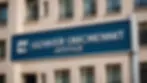 Eye-level view of a government procurement office sign