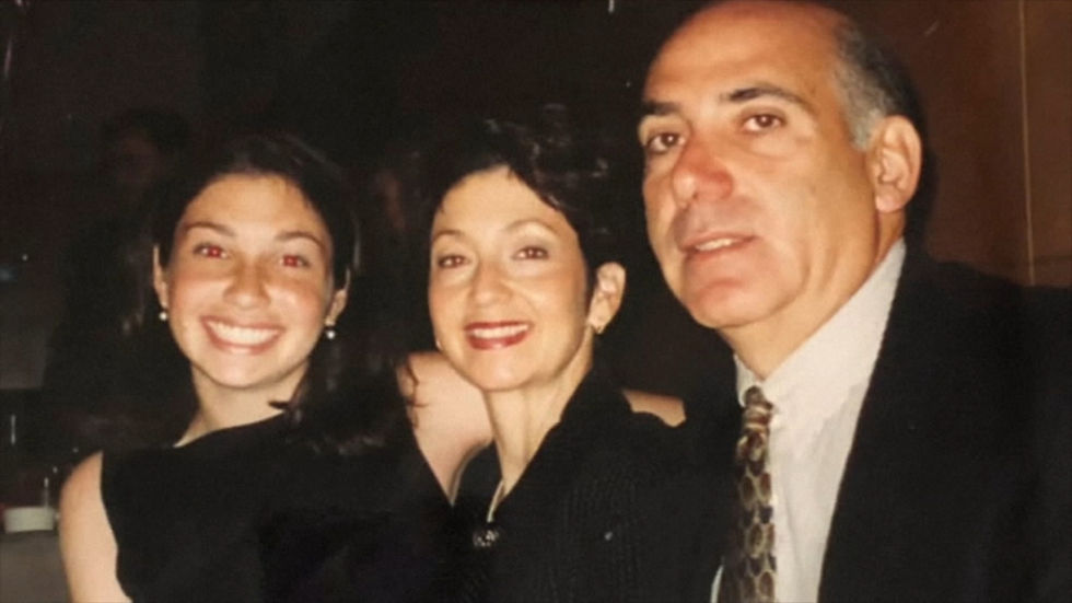 Ellen Greenberg at dinner with her parents