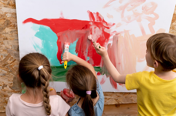 close-up-kids-painting-together.jpg
