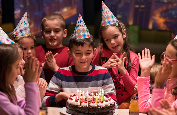 happy-young-boy-having-birthday-party.jpg