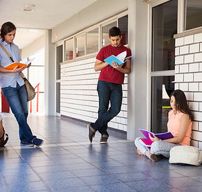 many-students-waiting-outside-classroom-studying-their-upcoming-test.jpg