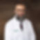 Dr. Hatem Elhagaly in clinical white coat