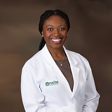 Dr. Olayemi Ajayi in clinical white coat