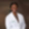 Dr. Olayemi Ajayi in clinical white coat
