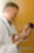 clinician-holding-baby-onsite-neonatal.jpg