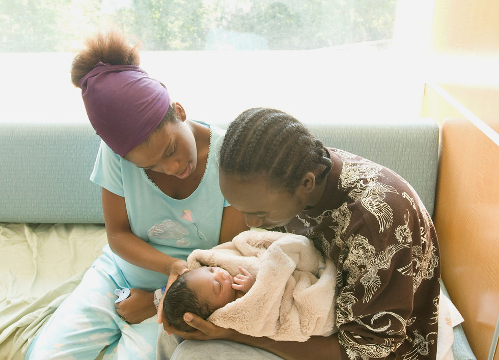 Clinician neonatal team consulting together