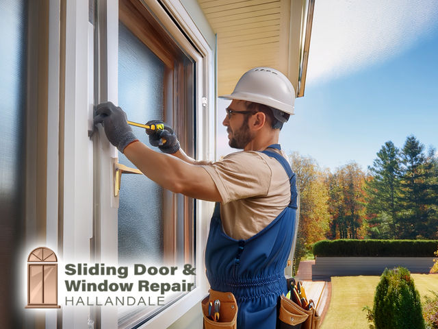 expert technician working on professional sliding door repair