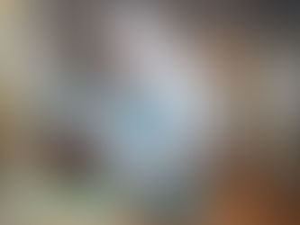 expert technician in hazmat suit using moisture meter inspecting walls during mold remediation service