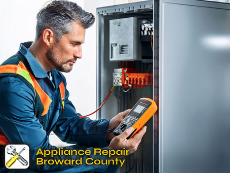 expert technician working appliance repair broward county inspecting ac unit energy efficiency