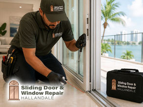 technician lubricating sliding door track and tightening hardware for maintenance, Florida home interior