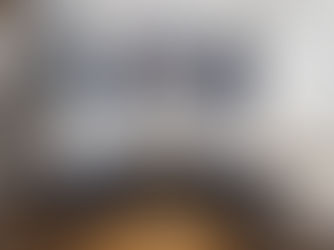 modern kitchen remodel remodeling with quartz countertops, large island, sleek cabinets, stainless steel appliances, bright natural lighting