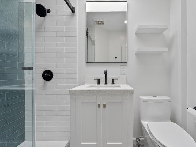 post luxury bathroom remodeling glass shower upgraded vanity tile toilet shelves