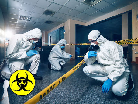 interior crime trauma scene with technicians in clean PPE working quietly