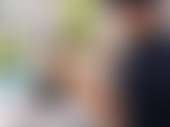 repair technician tightening sliding door lock hardware, Naples home interior view