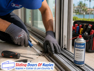 Close-up of sliding door track repair process, technician repairing damaged track, modern Naples residence, professional tools visible