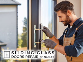 professional technician working upgrading sliding door handles and locks