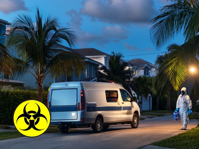 A trauma cleanup van parked quietly on a residential Boynton Beach street at dusk. A technician in PPE walks toward the house with equipment