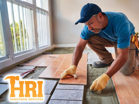 professional handyman repair it technician working performing expert floor tile installation at interior of residential property