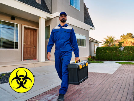 expert trauma cleanup technician walking toward a home in a clean, professional uniform, carrying a sealed equipment case