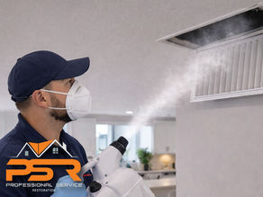 technician wearing mask, applying HVAC sanitizing mist, bright modern Miami condo