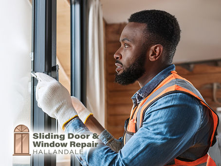 professional sliding door repair technician inspecting tracks and seals for routine maintenance service