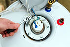 plumber_repairing_commercial_property_water_heater