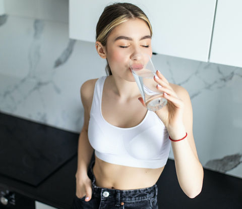 youn-girl-drinking-a-glass-of-water-2_edited.jpg