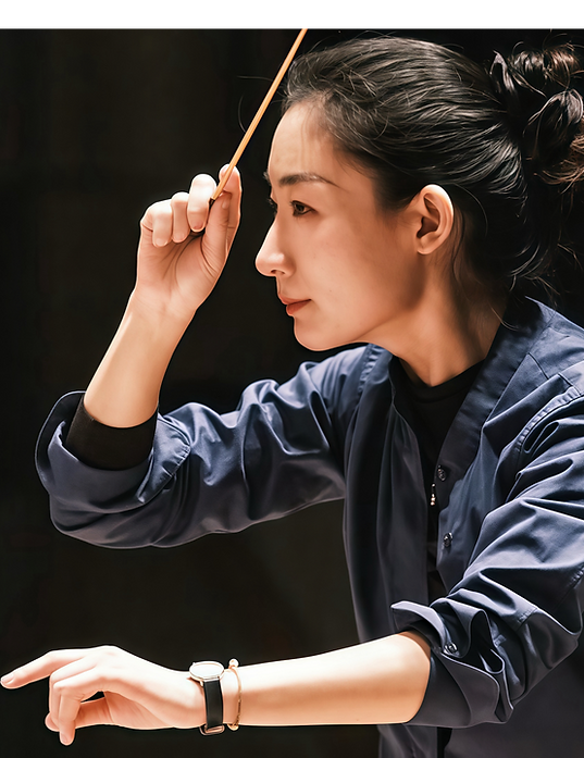 Yue Bao leading orchestra rehearsal as conductor