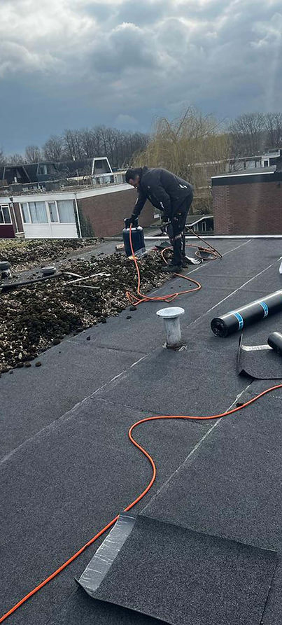 Roofing op plat dak leggen