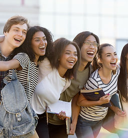 multiethnic-group-young-happy-students-standing-outdoors.jpg