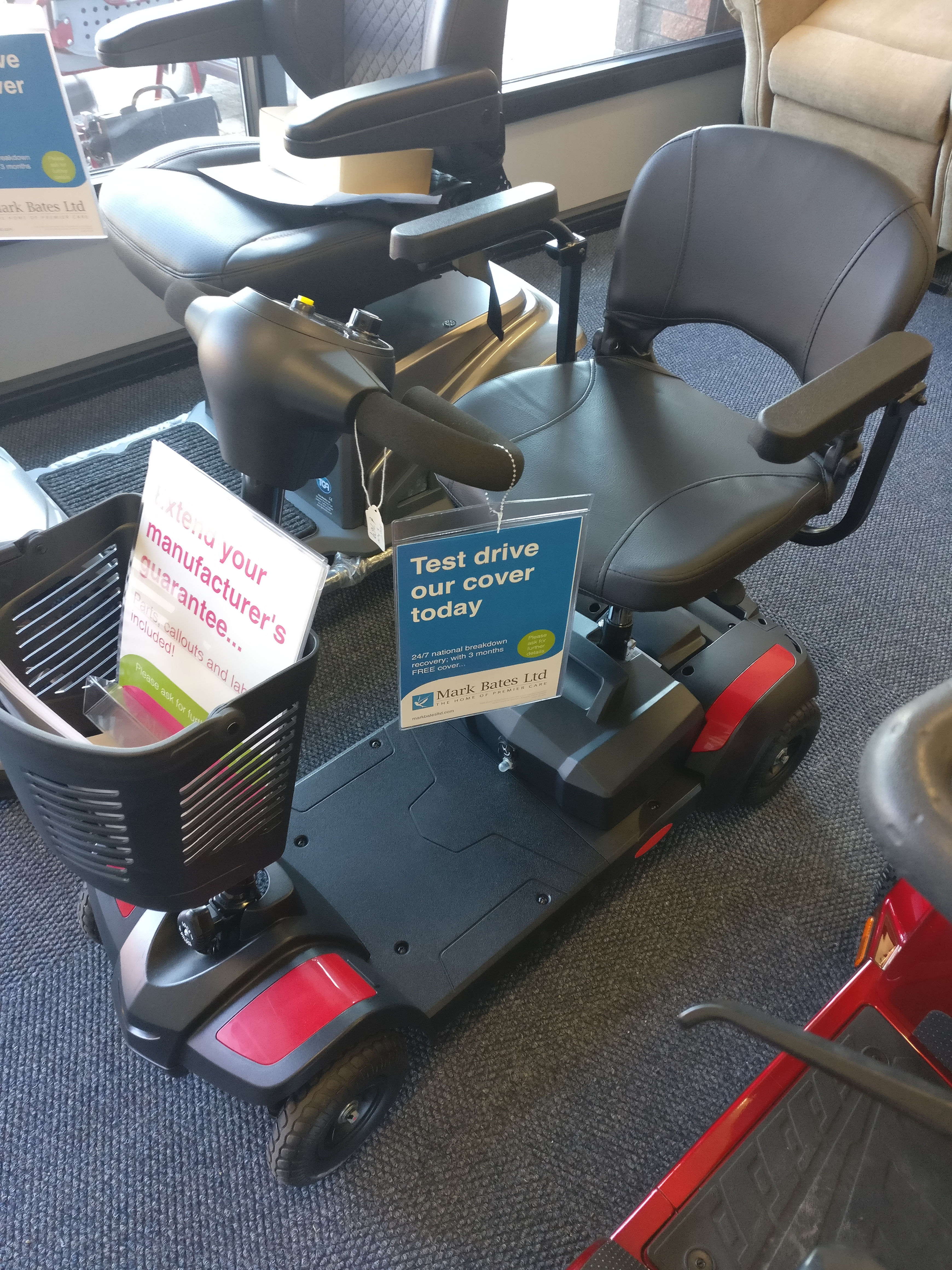 BARGAIN WEB DEAL!  Red compact,  travel,  folding,  boot mobility scooter. 4 MPH