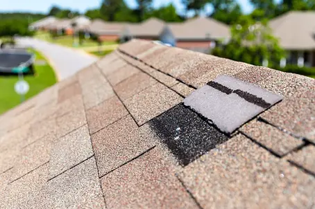 Stand Up Roofing team inspecting a wind-damaged roof in Anna, Texas.