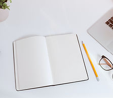 White work table with notes, smartphone