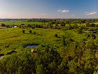 aerial-drone-view-bend-wide-river-green-meadows.jpg
