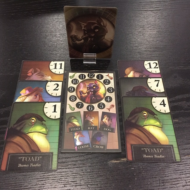Each player has a card in front them that they cannot see, which is their current Investigation Card. This is the card that they will attempt to figure out the details of; either the animal, the number, or both. Photo by Justin Borges, used with permission.