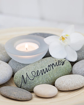 Still life with pebble with word memorie