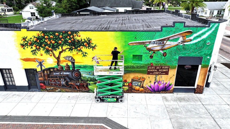 Painting-on-Lift-Ocoee-Mural-2026.jpg