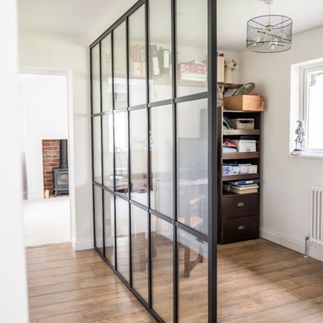 Steel framed internal door for open-plan living space