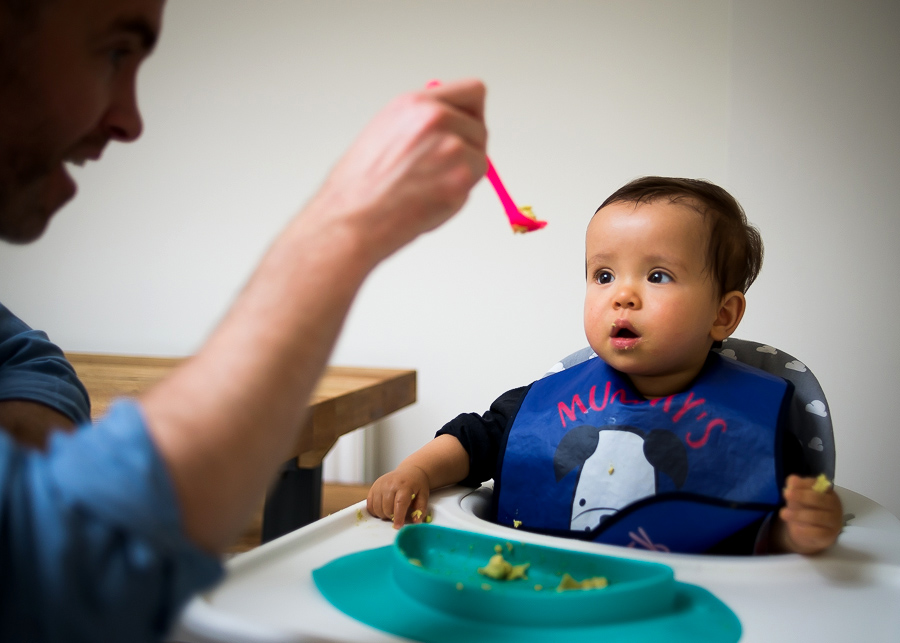 Dad feeding baby - Family session at home in Dublin