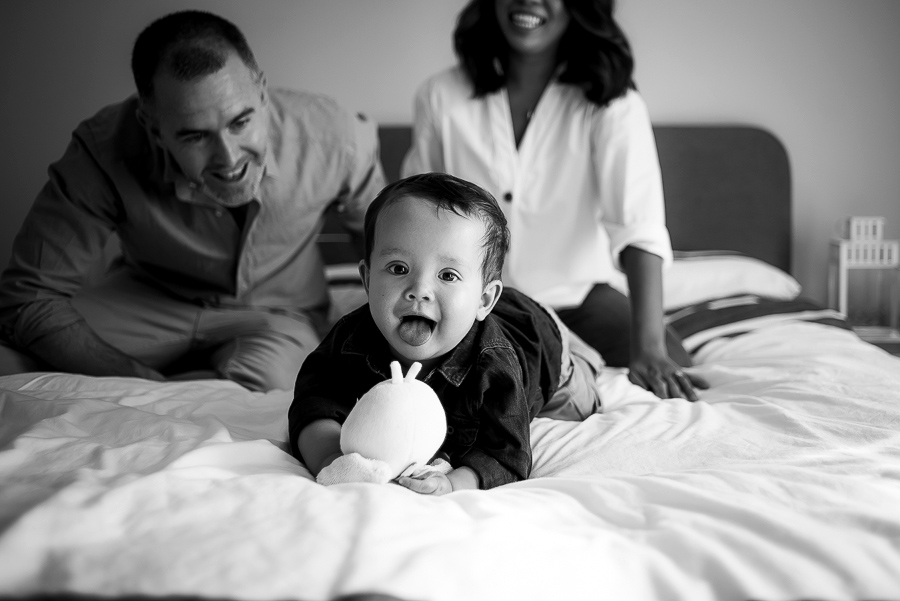 Family playing on the bed - Family photography session at home in Dublin by Camila Lee