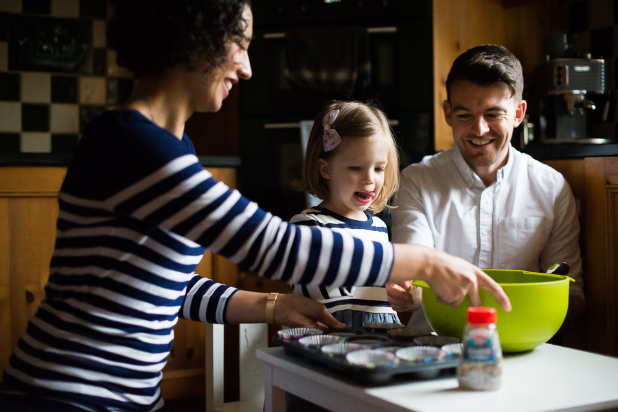 Family photoshoot at home in Dublin by Camila Lee - Mum, Dad and daughter Cooking