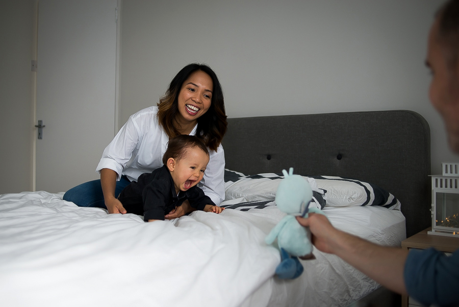 Baby boy's favourite toy - Family photography session at home in Dublin by Camila Lee