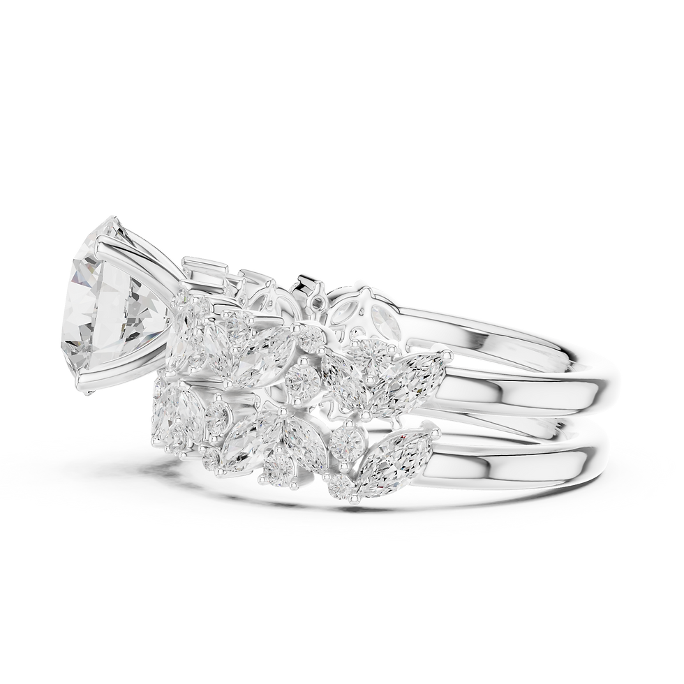 Thumbnail: Side view of white gold Estella Round bridal set showing open negative space between bands
