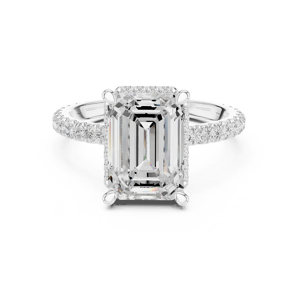 White gold Aurora emerald engagement ring with pavé prongs, hidden halo, and pavé band, front view.