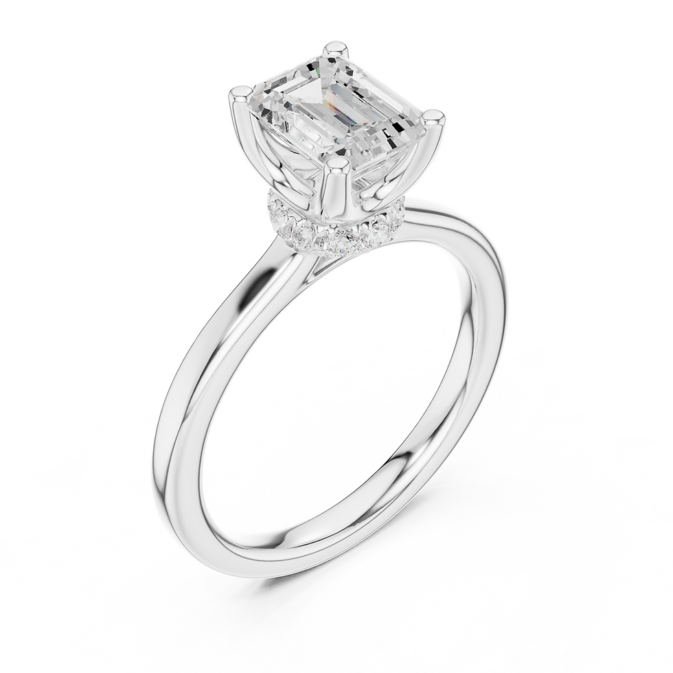 Petra Emerald white gold engagement ring at an angled view